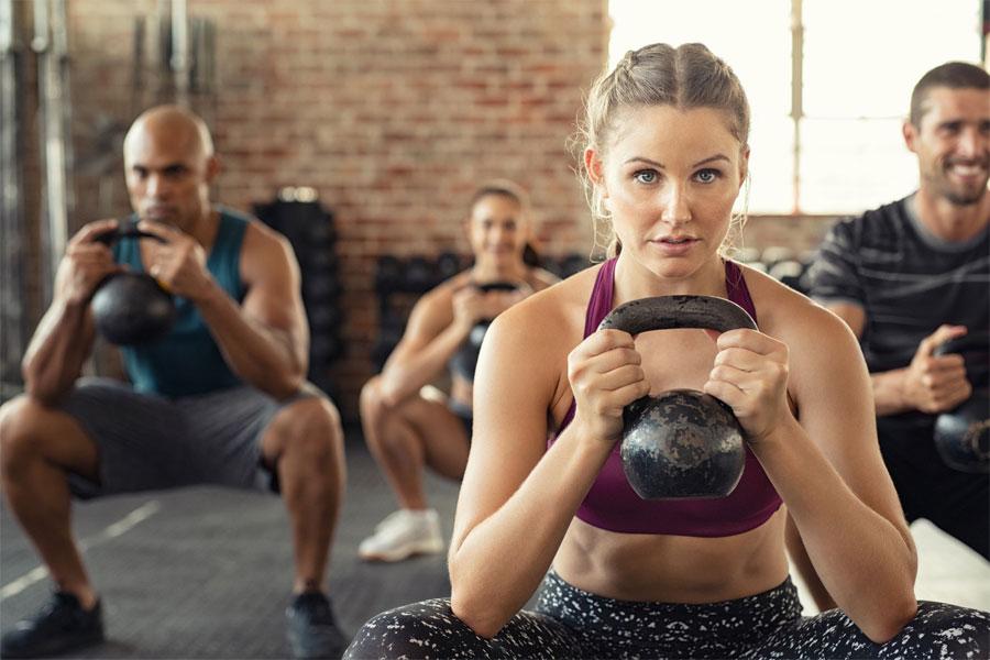 A Group Working Out Together in the gym