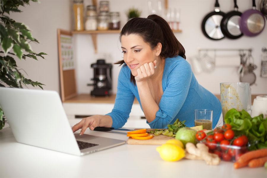A young girl using a laptop